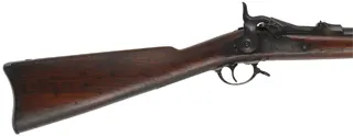 U.S. Model 1873 Springfield Infantry Rifle
caliber .45-70 Gov't, 32" barrel,
walnut stock, aged patina, bright bore
